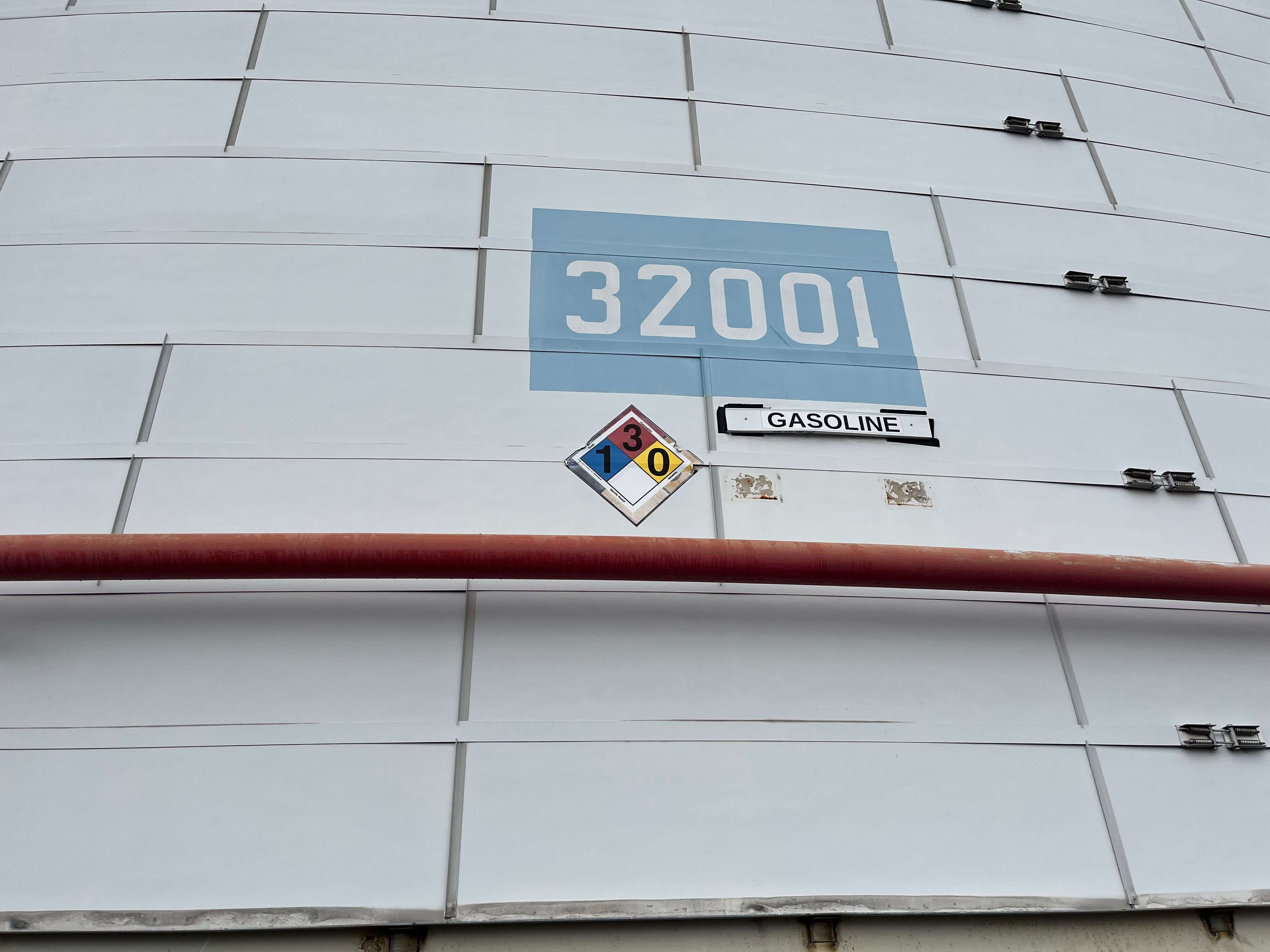 The number plate for SunocoLP’s Tank 32001 in Linden, New Jersey, is shown on the side of the tank.