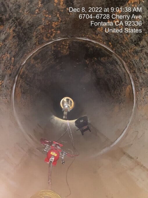 Widespread corrosion is evident on the interior surface of the Etiwanda Pipeline in Southern California.