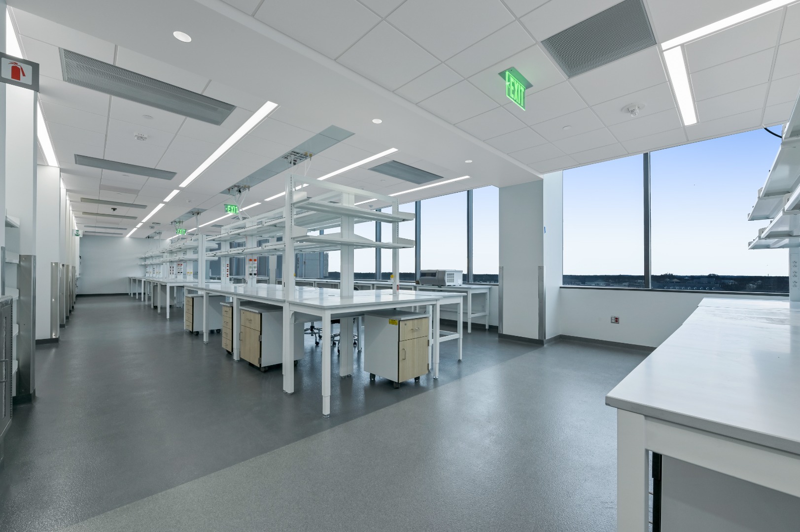 A newly renovated laboratory includes updated process equipment, work spaces, and a new epoxy floor topping.